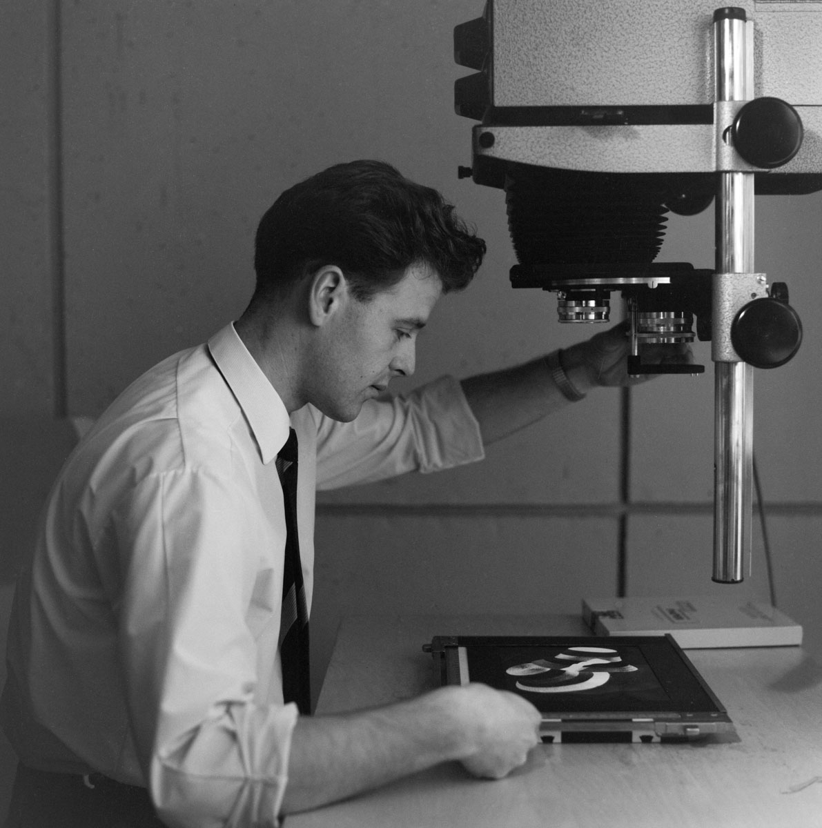 worker working with photo negatives
