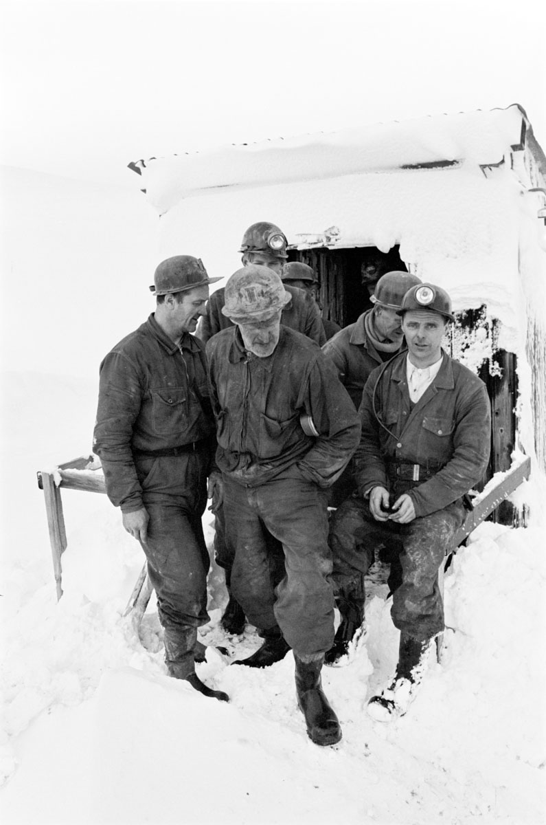 workers in snow and winter