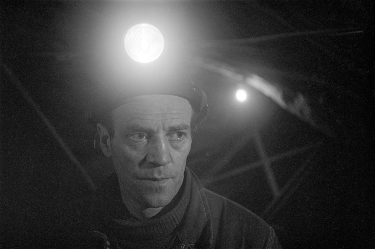 working with helmet and flashlight