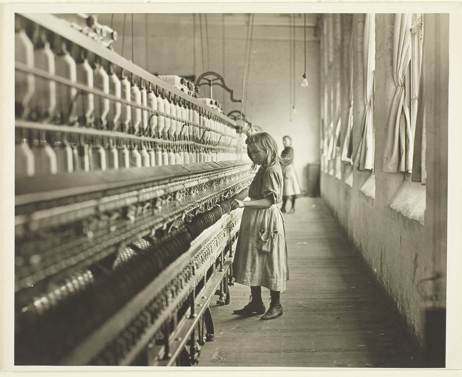 young girl at cotton mill
