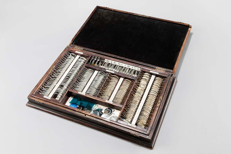 An open box with many different glasses.