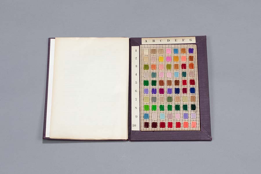 A book with several color samples.