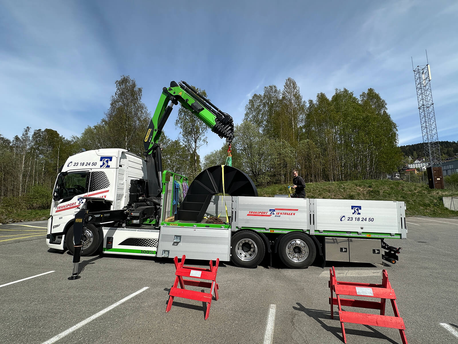 The stairs to the plane arrive in a small truck at the norwegian museum of science and technology