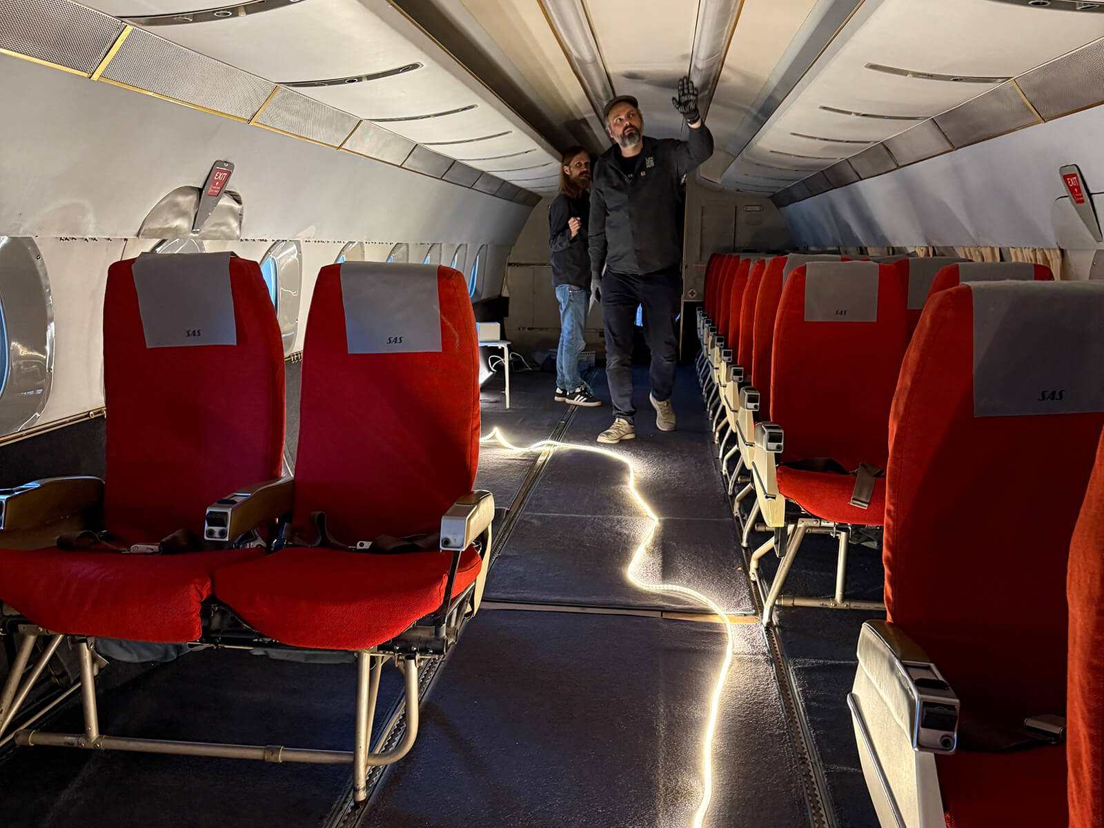 conservators inside the cabin of the aircraft