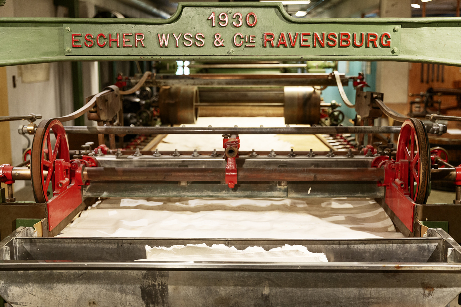 Close-up of paper machine with the text 1930 and Escher Wyss &amp; Ravensburg