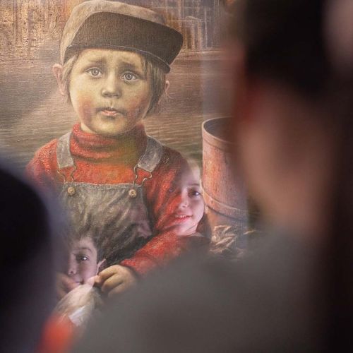 Painting of a little boy. Photo.