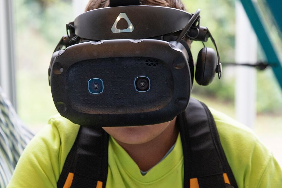 young boy with VR glasses during research square at The Norwegian Museum of Science and Technology in Oslo