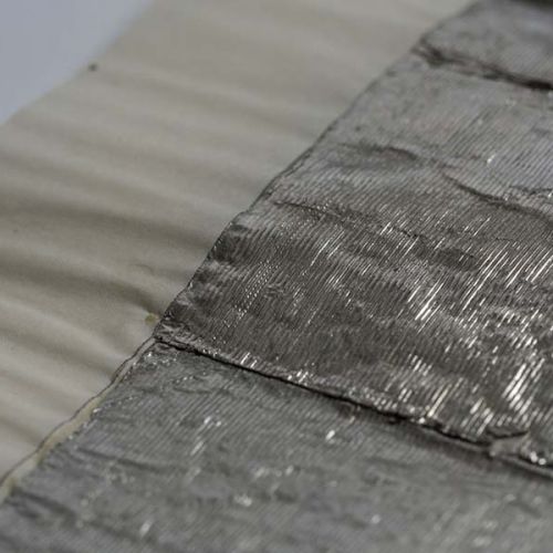 Small pieces of tinfoil. Photo.