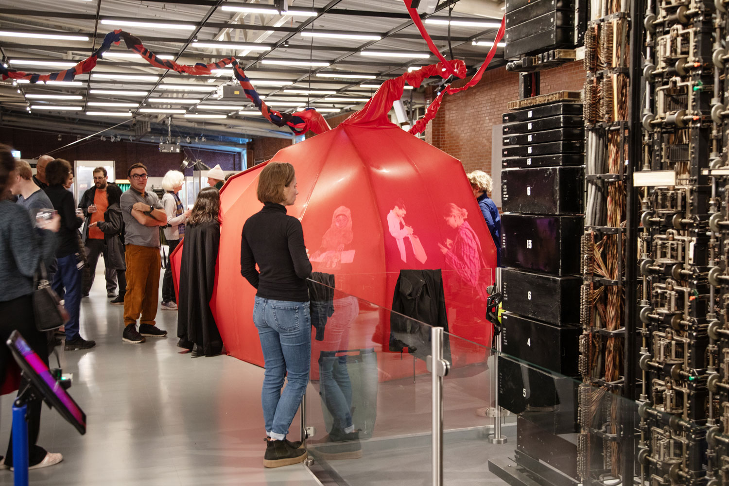 More visitors exploring the artwork that resembles the organ of the heart. 