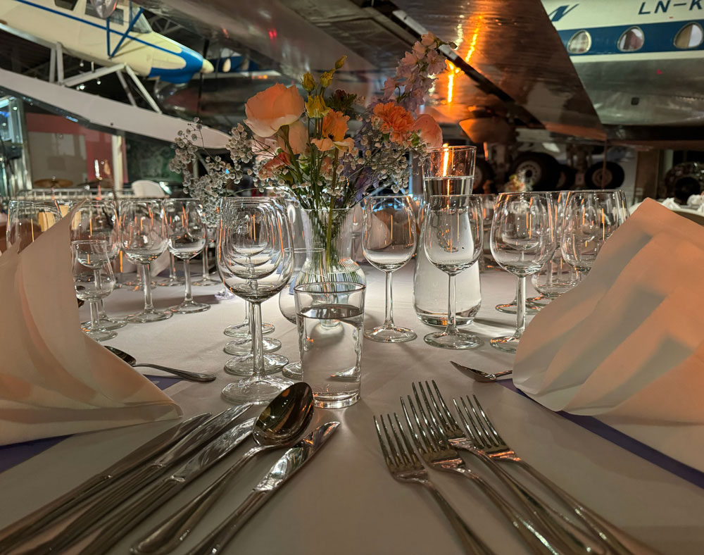 A table set for dinner with flowers
