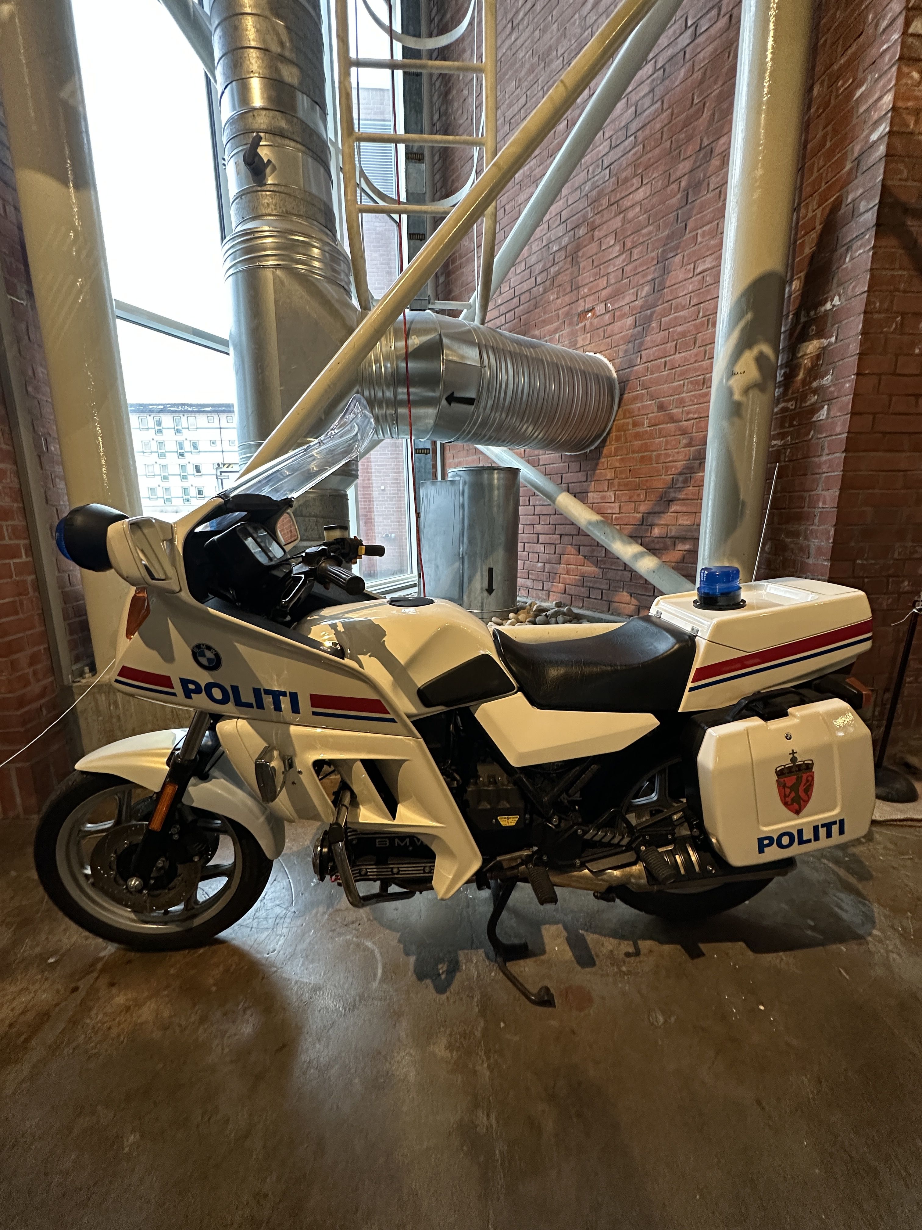 Police motorcycle outside The Norwegian Museum of Science and Technology