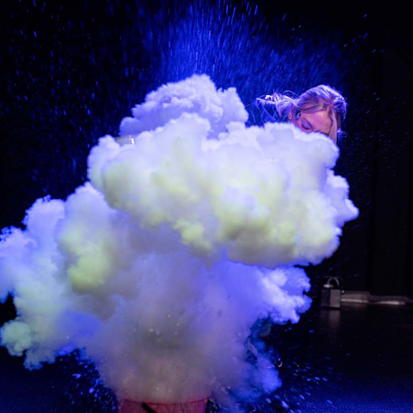 Big white cloud of smoke and a museum educator