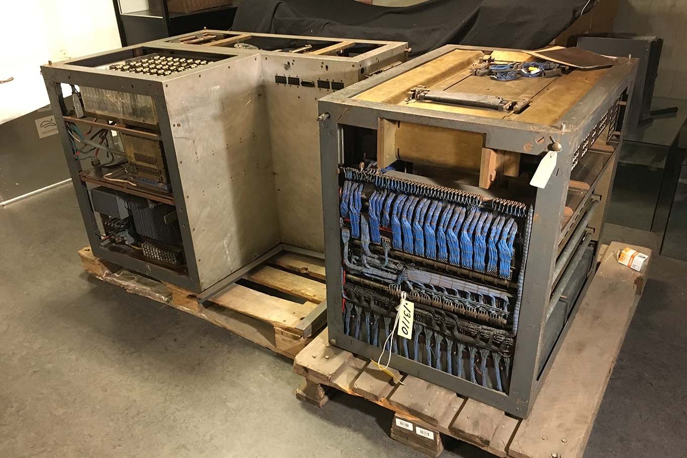 Old machine on two wooden pallets