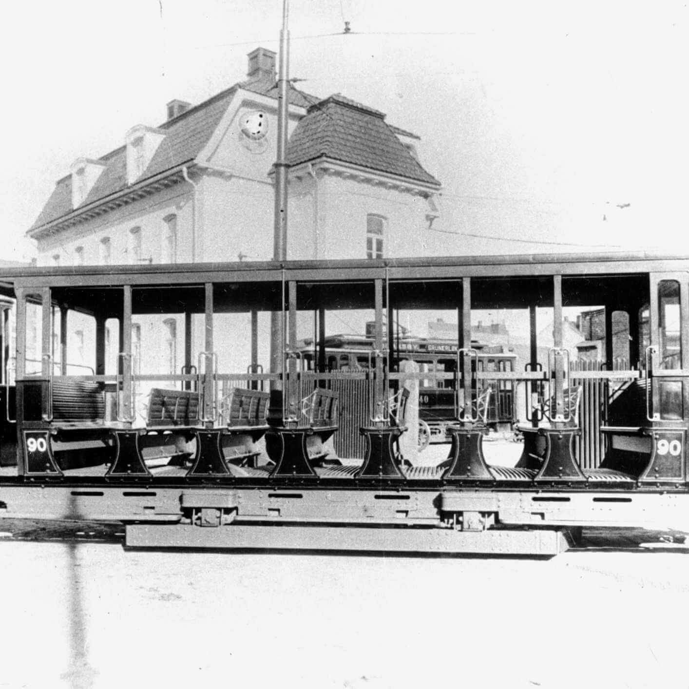 analog photo of old tram with open summer carriage