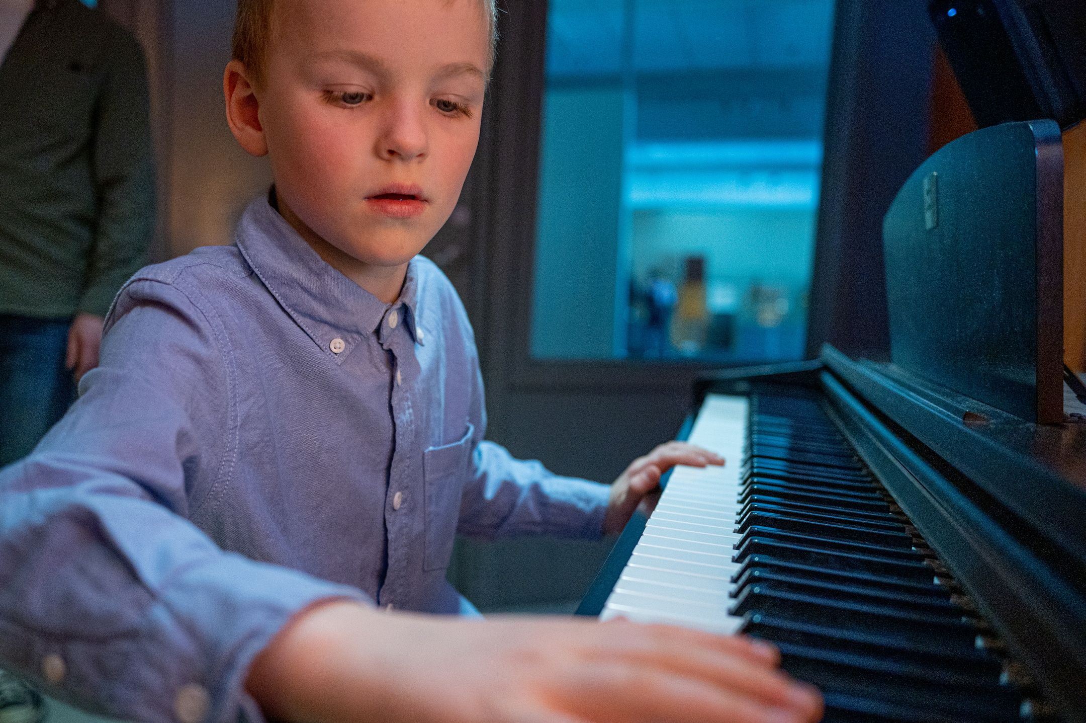 Boy playing the piano